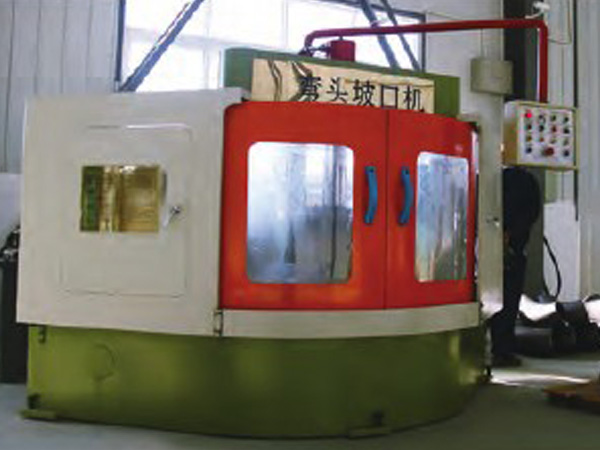 Elbow beveling machine